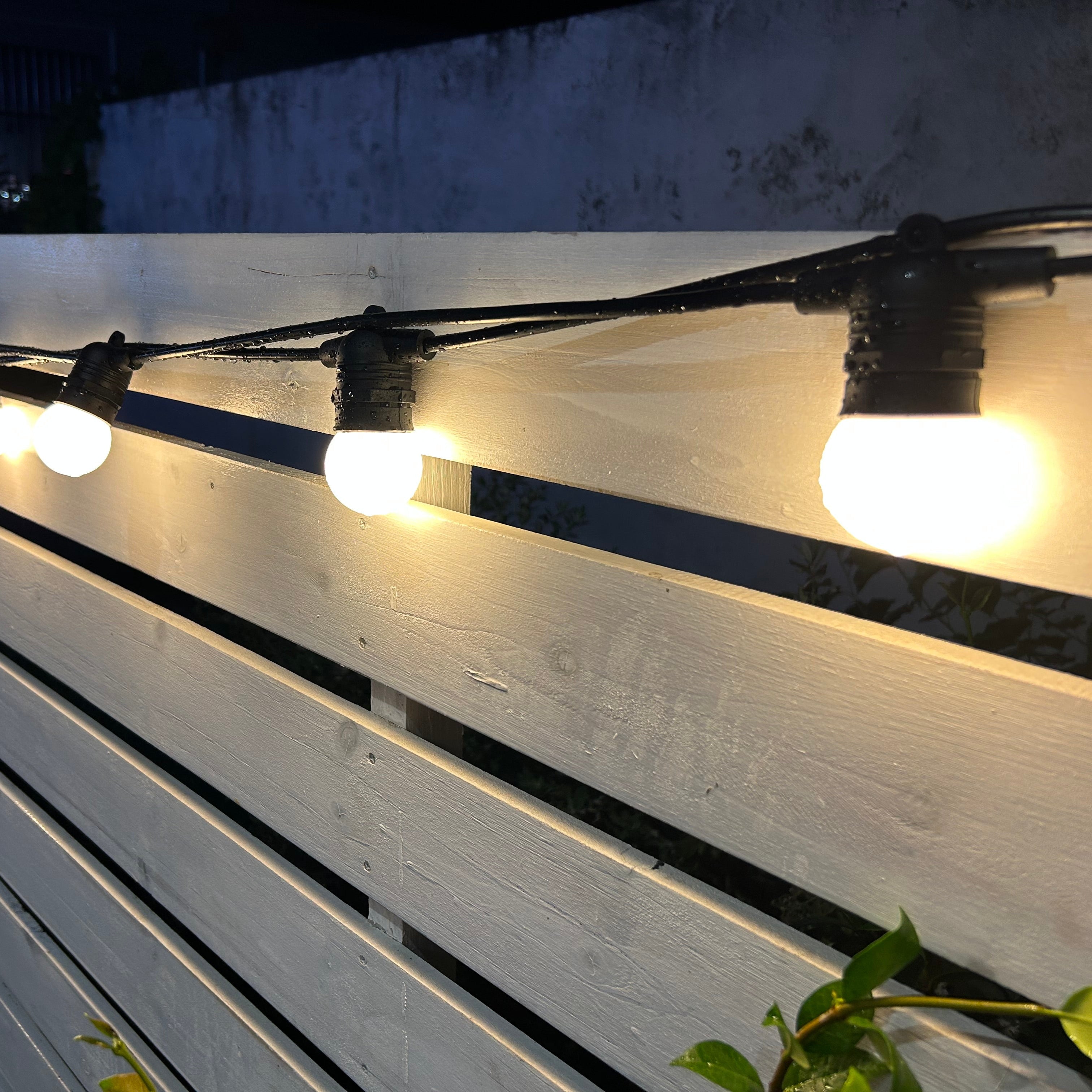 5m - 100m Festoon Heavy Duty Meribel Lighting IP65 - Soft Warm White - Frosted Bulbs on Black Rubber Cable